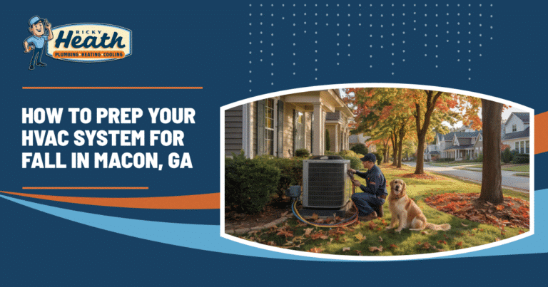 A technician inspects an outdoor HVAC system beside a house in a suburban Macon GA neighborhood, while a dog sits nearby amid autumn leaves scattered on the ground.