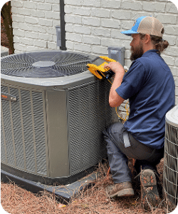 Ricky Heath Technician Servicing AC Unit
